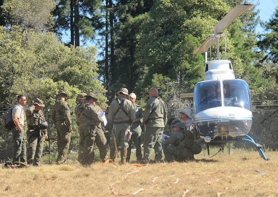 law enforcemen with helicopter